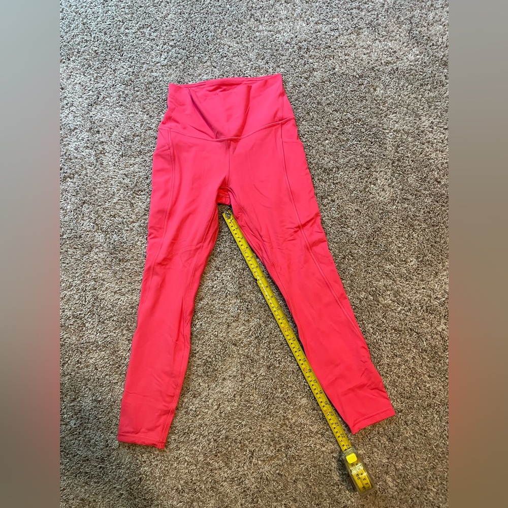 Only worn once! Lululemon Align 23” with pockets size 6 color lipgloss